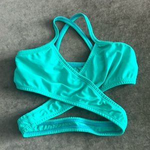 2nd Skin Cali Top. Crisscross front. wrap around torso. Color- green. Size- S